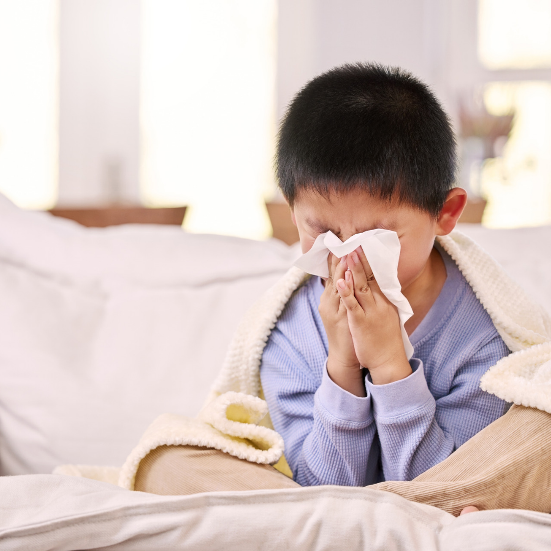child sneezing