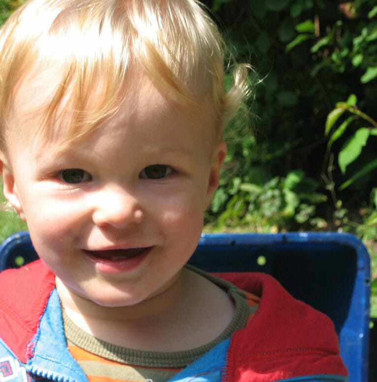Toddler staring at camera